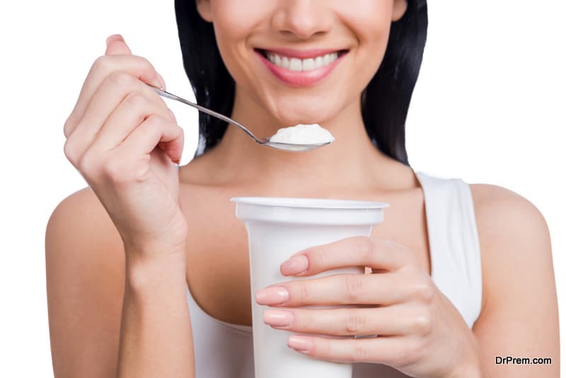 woman taking probiotic meal
