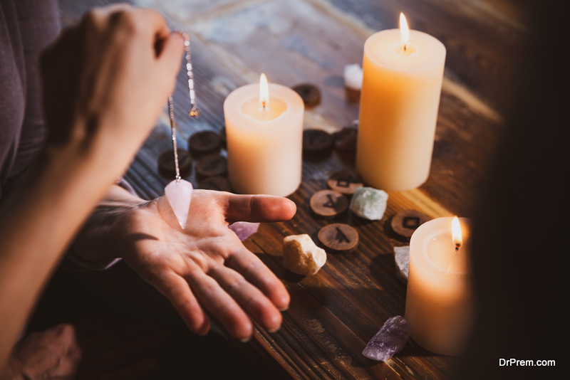 healing or oracle foretelling, candles, runes and healing stones