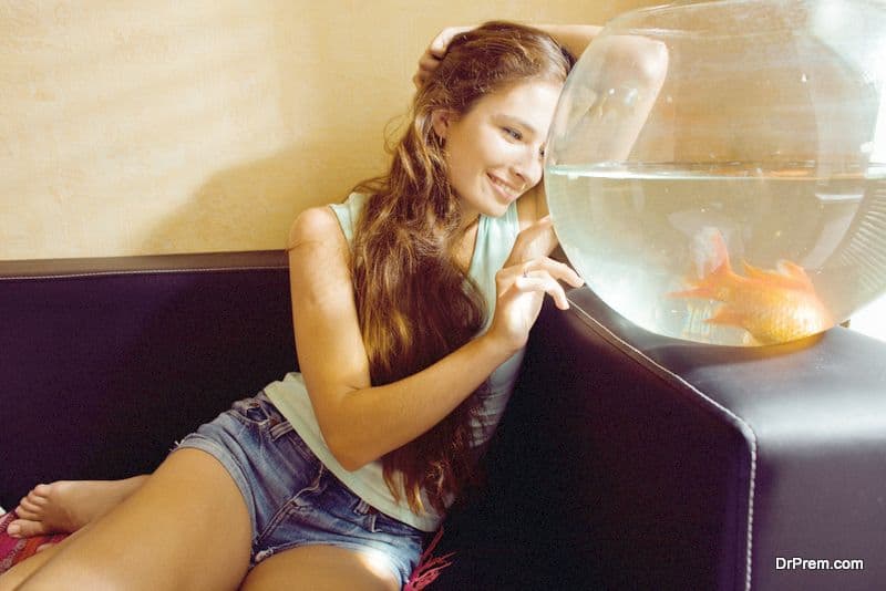 woman kept a fish as a companion