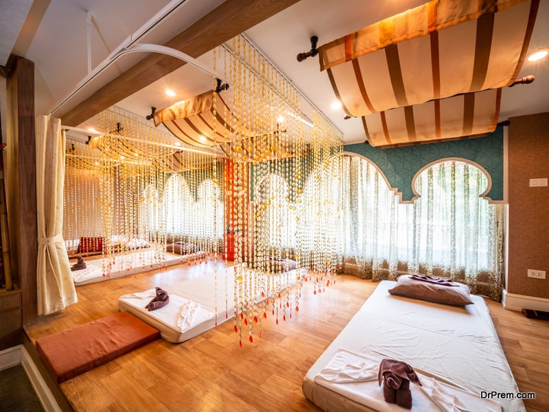 A Guide to Wellness Resort Cottages and Villas – Definition, Features, Planning, Design, Benefits, and More 34 Interior of vintage massage room with nature light source from window, Thailand