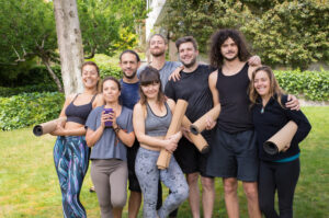 Are You Tapping into Longevity Tourism? Dr Prem’s Strategic Guide to the Billion-Dollar Future of Global Wellness Tourism happy men women from yoga club having fun