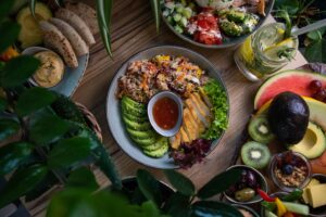 Why 7 Days in Nature Can Reset Well-Being, Immunity, and Human Performance 9 Why 7 Days in Nature Can Reset Well-Being, Immunity, and Human Performance high angle shot plates salad fresh fruits vegetable wooden surface
