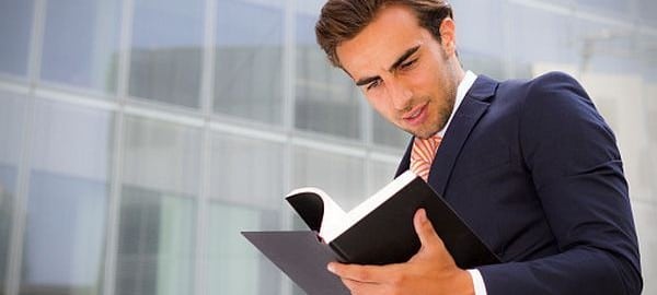 Young Entrepreneur reading book