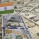 Flag of India sticking in various american banknotes.(series)