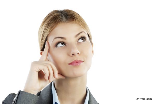 Young business woman thinking. Isolated on the white background. [url=http://www.istockphoto.com/search/lightbox/9786622][img]http://dl.dropbox.com/u/40117171/business.jpg[/img][/url]