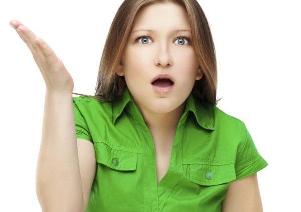 Angry young woman. White Background