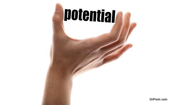 Color horizontal shot of a of a hand squeezing the word "potential".