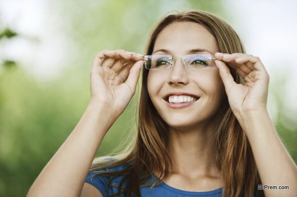 portrait charming young woman glasses smiling background summer nature