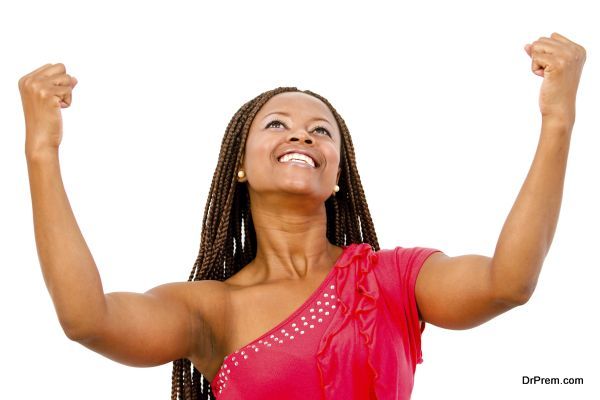 Black woman with arms up