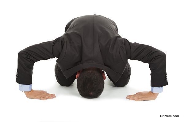businessman apologize with japanese kneeling position