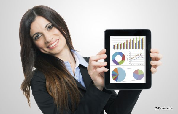 Businesswoman showing financial reports on a tablet computer