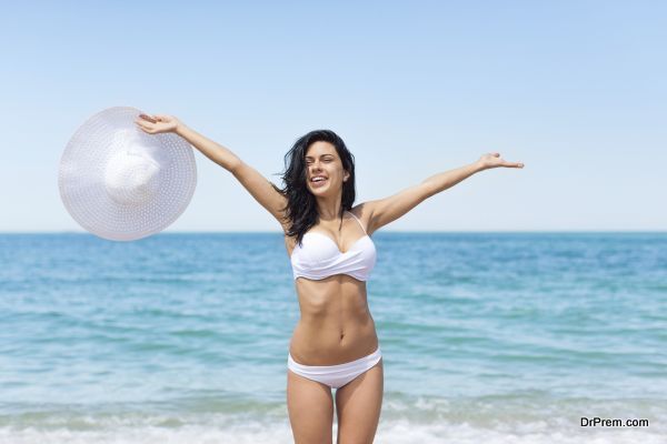 woman happy excited smile on beach