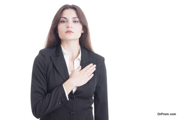 Young female politician or lawyer making an oath