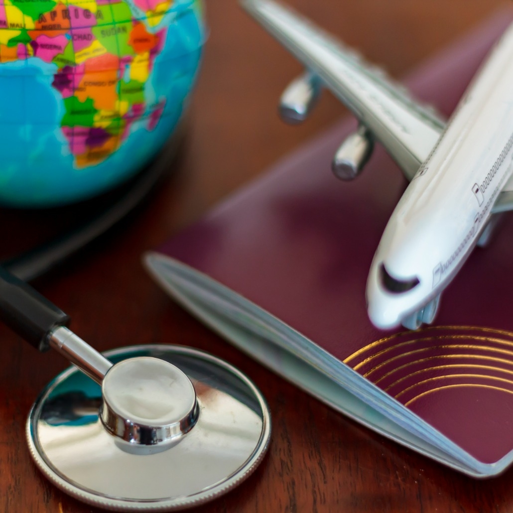 global-healthcare-and-travel-insurance-concept-passport-stethoscope-picture-id1136682931