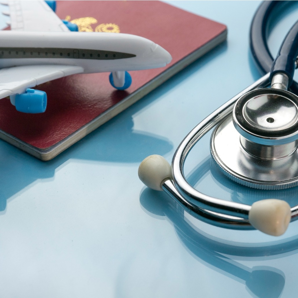 healthcaretransportation-and-tourism-concept-with-stethoscope-and-picture-id1331975194