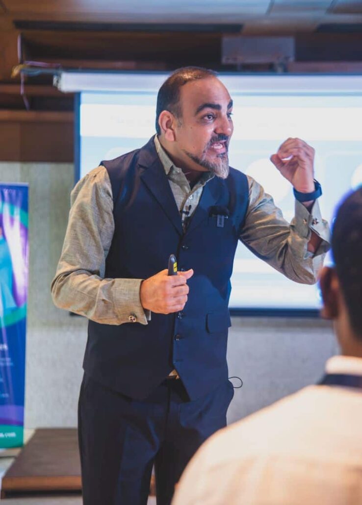 Speaker presenting at a wellness event.